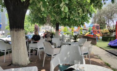 Traditional Albanian coffee served in a small cup at a local café