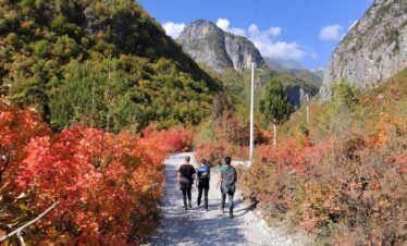 Theth valley surrounded by Albanian Alps mountains on a clear summer day
