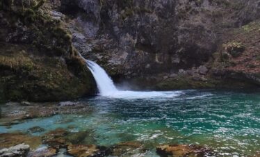 Crystal blue natural spring at the Blue Eye of Theth, Albania