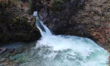 Crystal blue natural spring at the Blue Eye of Theth, Albania in winter
