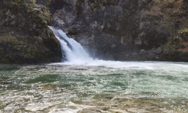 Crystal blue natural spring at the Blue Eye of Theth, Albania in winter